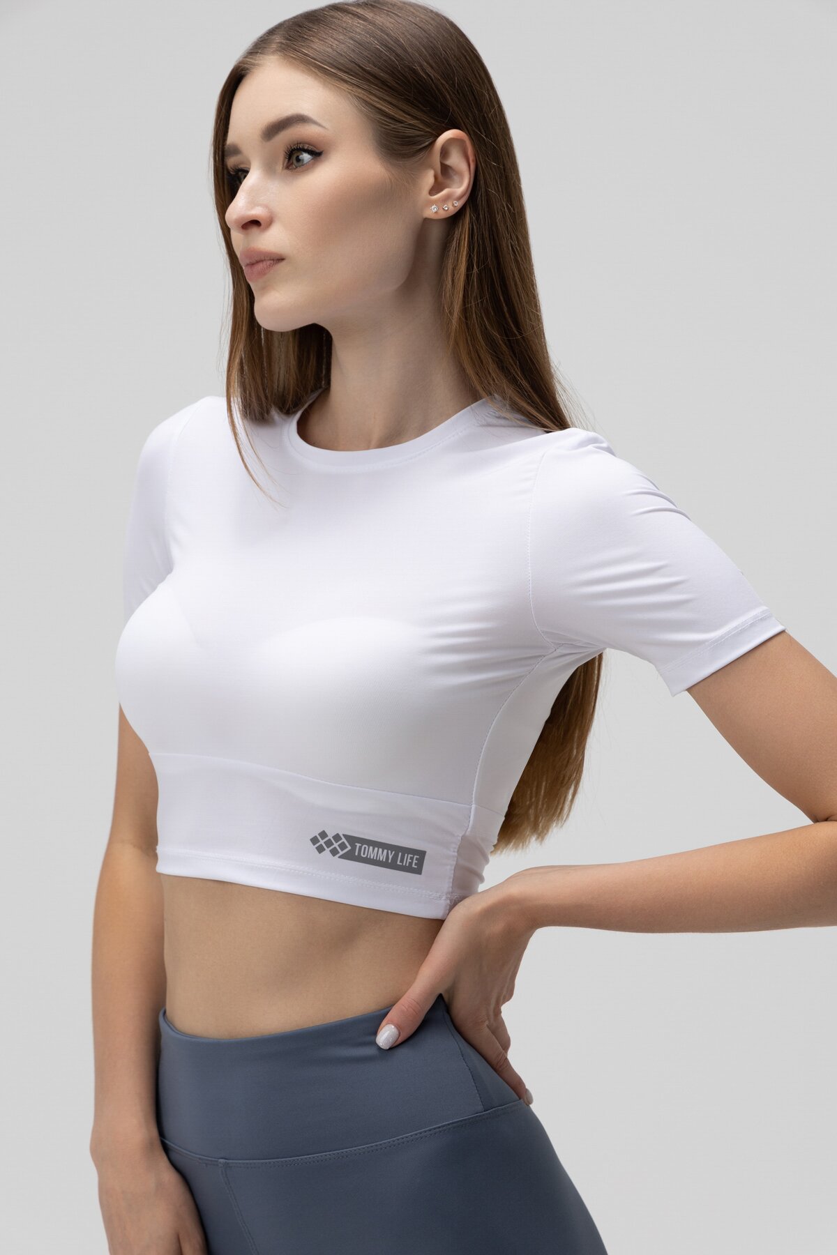 Топ фітнес однотонний жіночий Tommy life 97265 L Білий (2000989973225A)  Фото №1